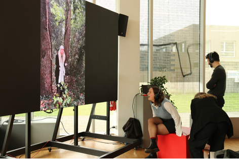 Audience viewing the GAIA exhibition